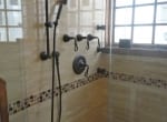 Travertine and Glass Mosaic Shower